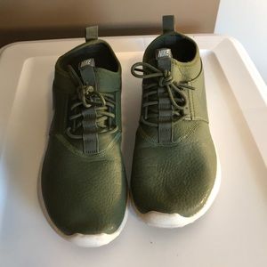 Green Nike athletic shoes